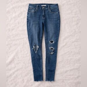 Levi’s Super Skinny Jeans Women’s Size 28 Distressed Raw Hem Medium Wash Denim